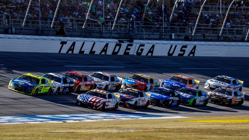Ryan Blaney (12) leads the field through the tri-oval during a NASCAR Cup Series auto race...
