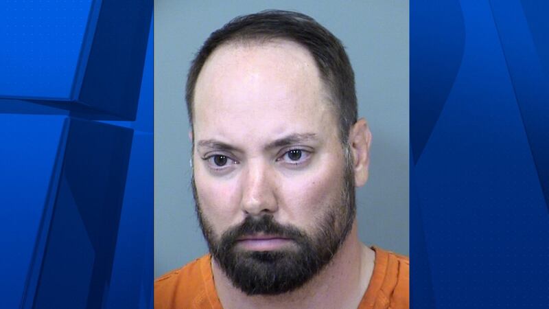 Hoops was booked on one count of second-degree murder and one count of shooting a gun within a...