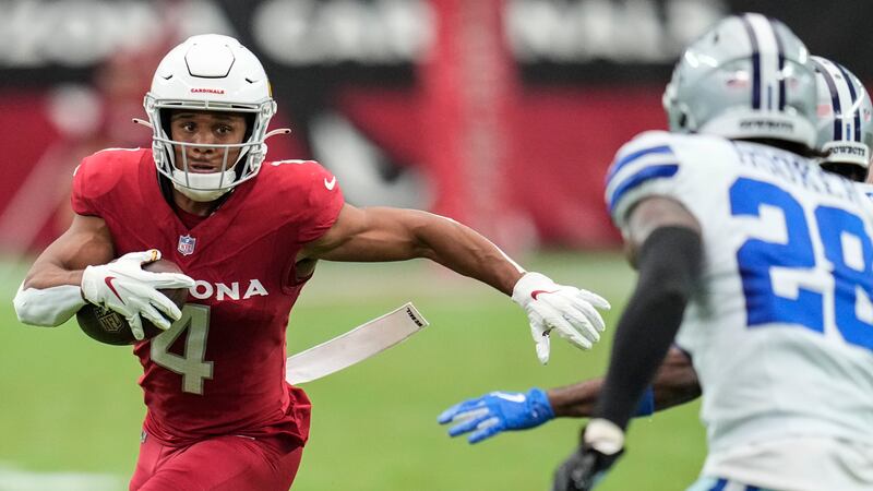 Arizona Cardinals wide receiver Rondale Moore (4) runs against Dallas Cowboys safety Malik...