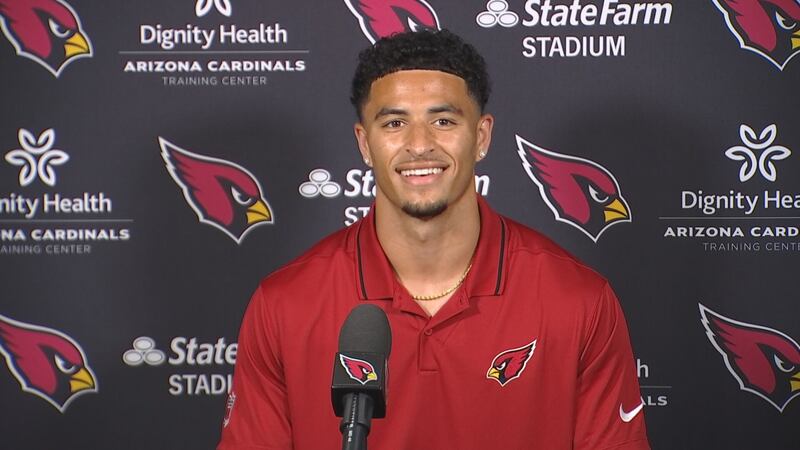 Michael Wilson speaks to the media after signing a four-year deal with the Cardinals