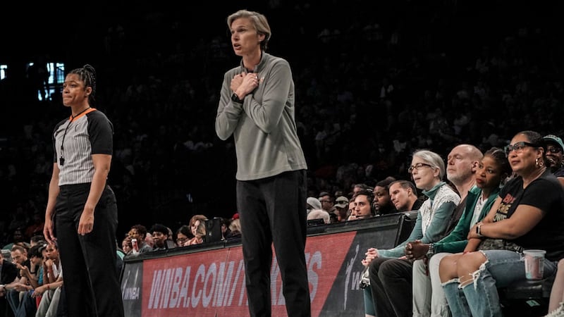 Phoenix Mercury coach Vanessa Nygaard, center, gestures a play during the fourth quarter of a...