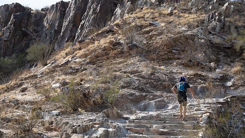 A hiker ascends the summit trail on Piestewa Peak in Phoenix.