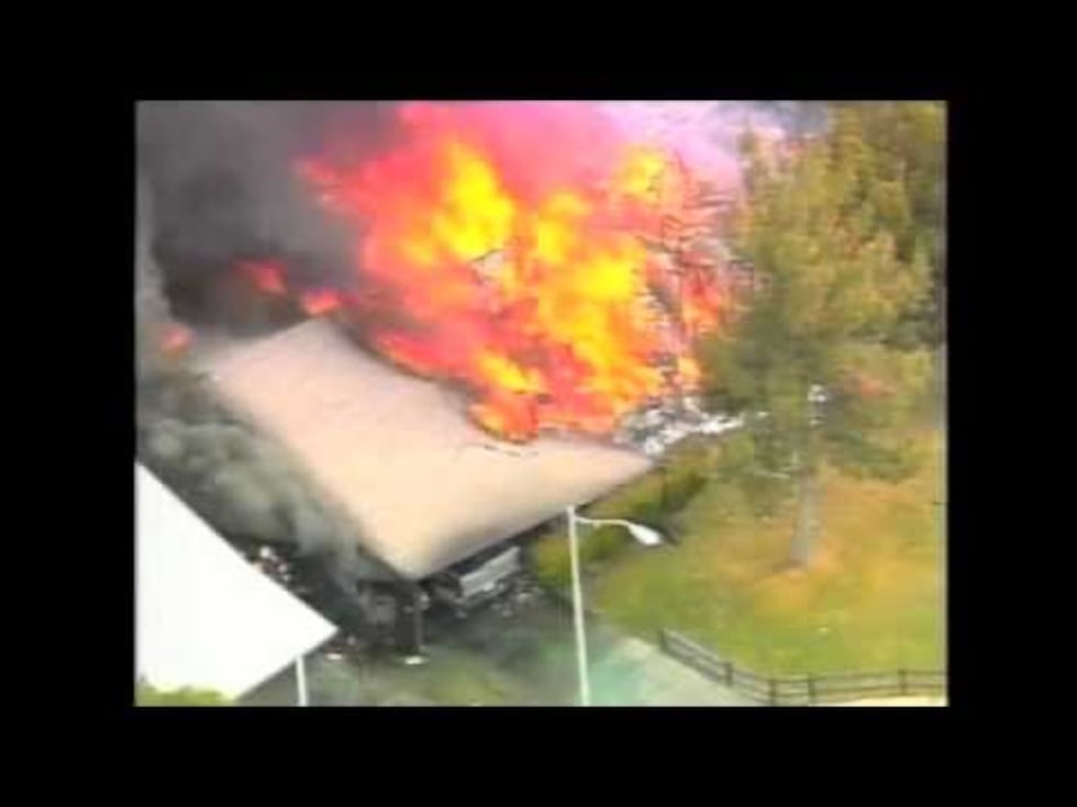 The Fisher home burns
