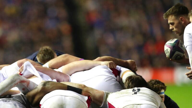 England's Ben Youngs, right prepares to put the ball into a scrum during the Six Nations rugby...