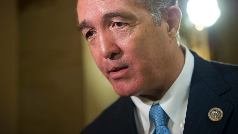 FILE - Rep. Trent Franks, R-Ariz. speaks with a reporter on Capitol Hill in Washington, March...