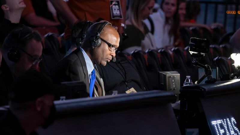 ESPN Longhorn Network announcer Lance Blanks prepares before an NCAA college basketball game...
