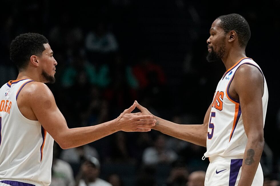 Phoenix Suns forward Kevin Durant celebrates after their win against the Charlotte Hornets...