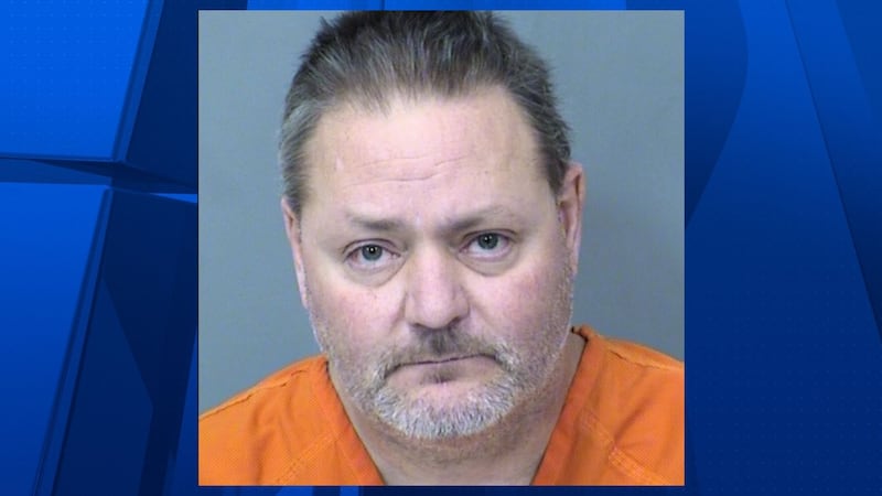 Timothy Staufenbeil, 48, is accused of shooting his girlfriend in the back of the head in Mesa.
