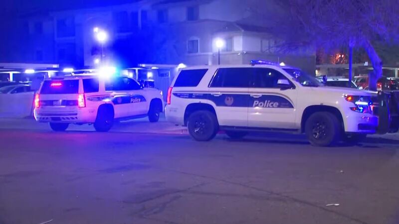A heavy police presence could be seen near an apartment complex.
