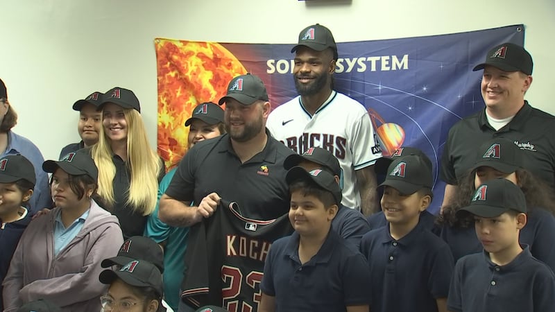 Diamondbacks pitcher Miguel Castro was in attendance to surprise Koch with his own...