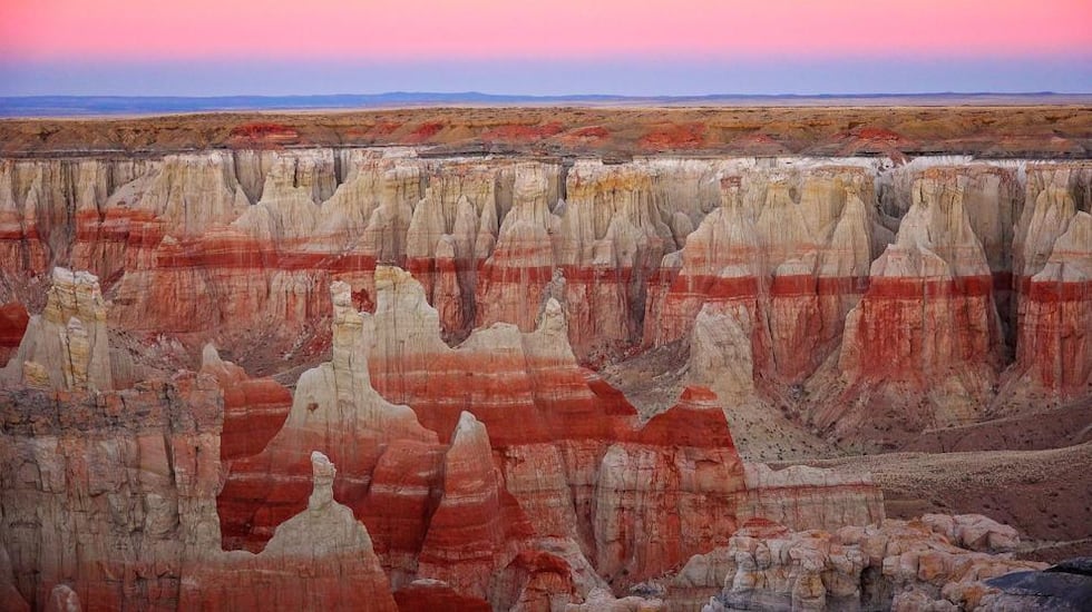Pink light of twilight in the sky at Coal Mine Canyon in Tuba City, Arizona. (Source: 123rf.com)