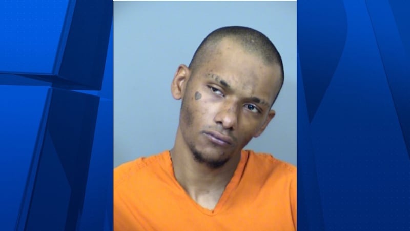 Phoenix police have identified the man who pointed a handgun at officers inside a north...