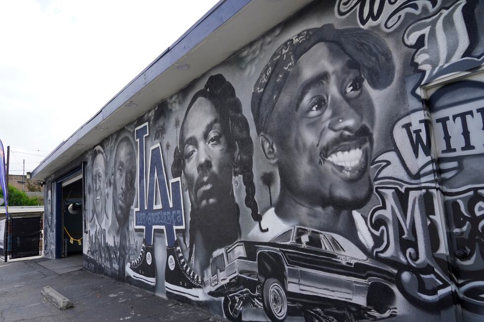 A portion of a mural by artist sloe_motions depicting Oscar De La Hoya, Vin Scully, Kobe...
