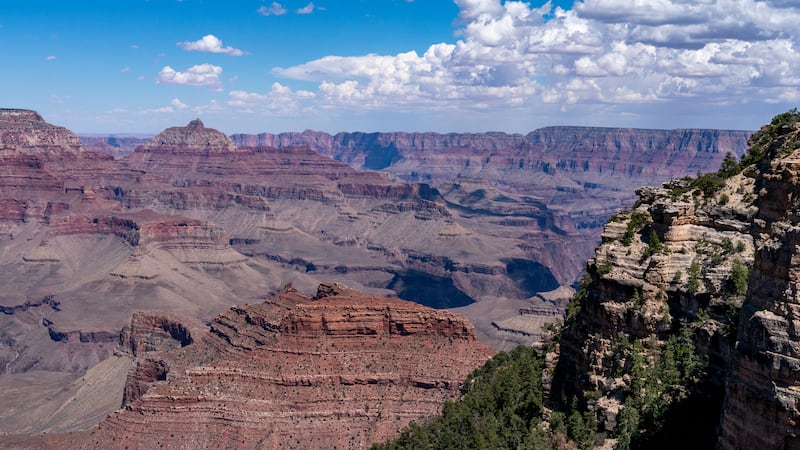 Clouds pass over the South Rim of Grand Canyon National Park in Grand Canyon Village, Ariz.,...