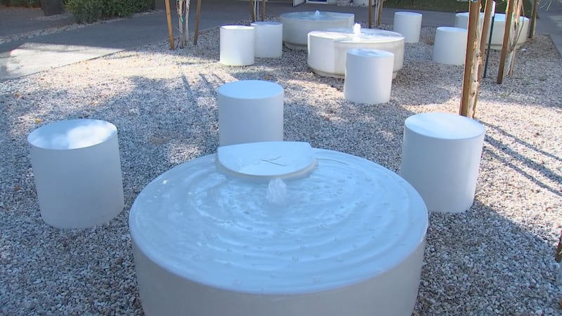 This photo shows the water feature in the green space at The Frederick on Missouri.