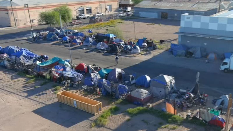 Police are investigating crimes at "The Zone", Phoenix's largest homeless encampment, after a...