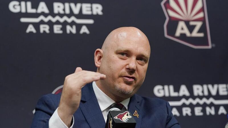 FILE - In this July 1, 2021, file photo, Arizona Coyotes new head coach Andre Tourigny speaks...
