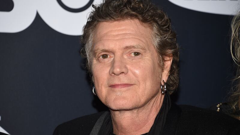 FILE - Rick Allen, of Def Leppard, arrives at the Rock & Roll Hall of Fame induction ceremony...