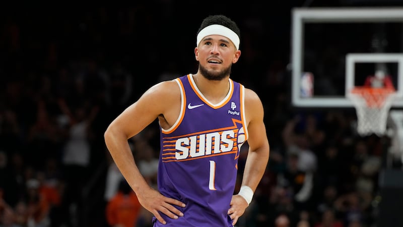 Phoenix Suns guard Devin Booker (1) during the first half of an NBA basketball game against...