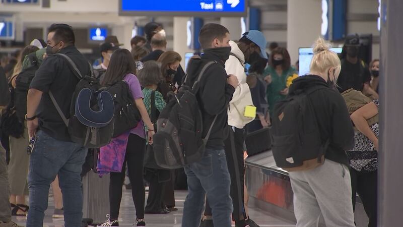 File photo of passengers at Sky Harbor International Airport.