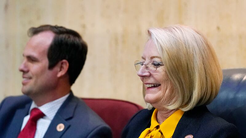Arizona Senate President Karen Fann, R-Prescott, right, smiles as she is joined by state Sen....