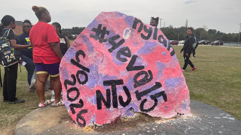 Nylah Tutt's family, along with her classmates, decorated a rock in front of the high school...